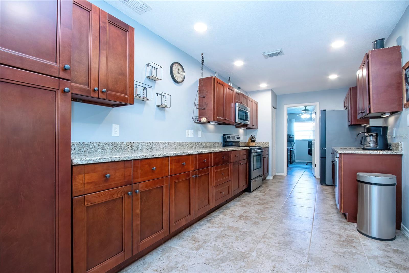 Craftsman style cabinets,  Granite counters, lots of work space