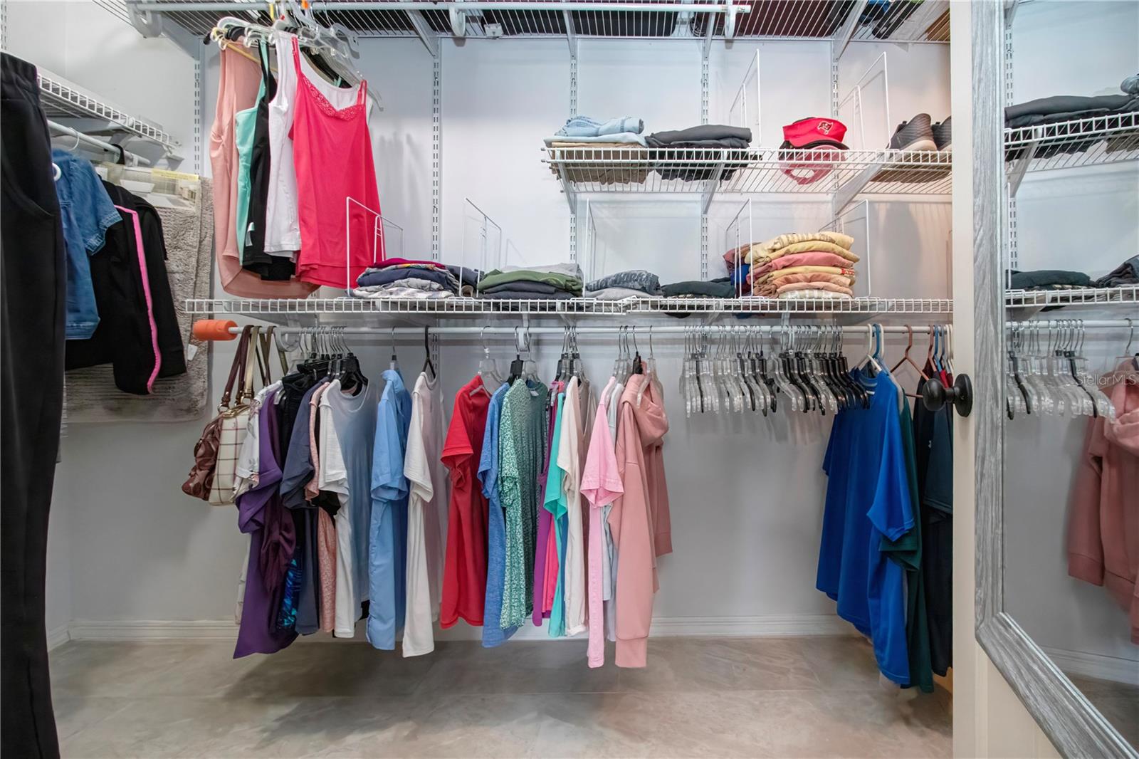 Large walk-in closet with adjustable shelves