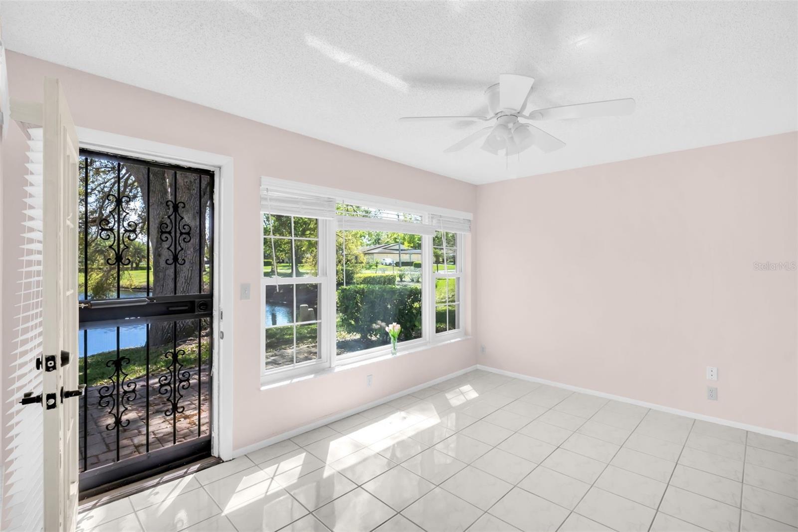 Door opens to large paver patio~