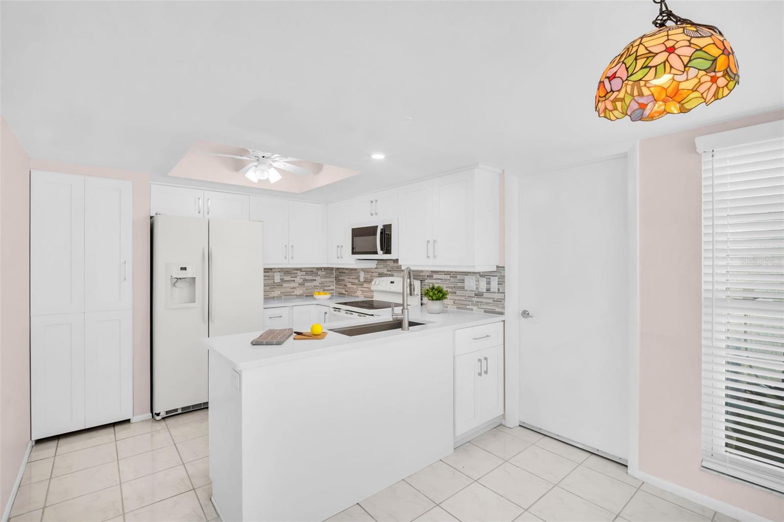 Updated kitchen with open counter, pantry closet, & breakfast nook~