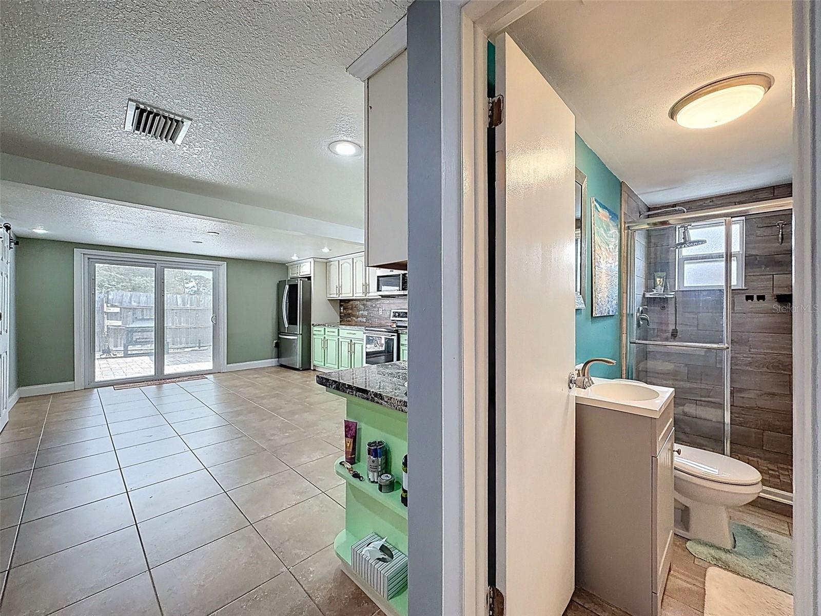 BATHROOM OFF OF KITCHEN WALKWAY