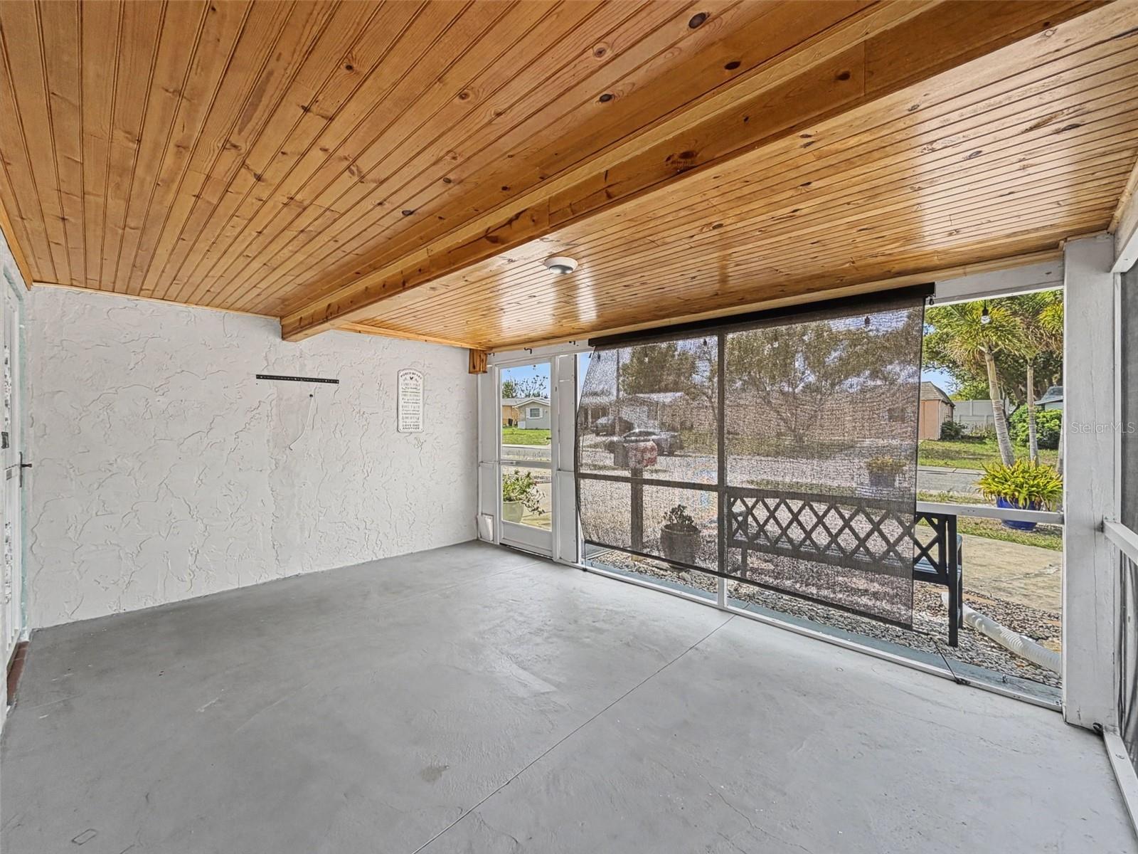 LARGE SCREENED IN FRONT PORCH