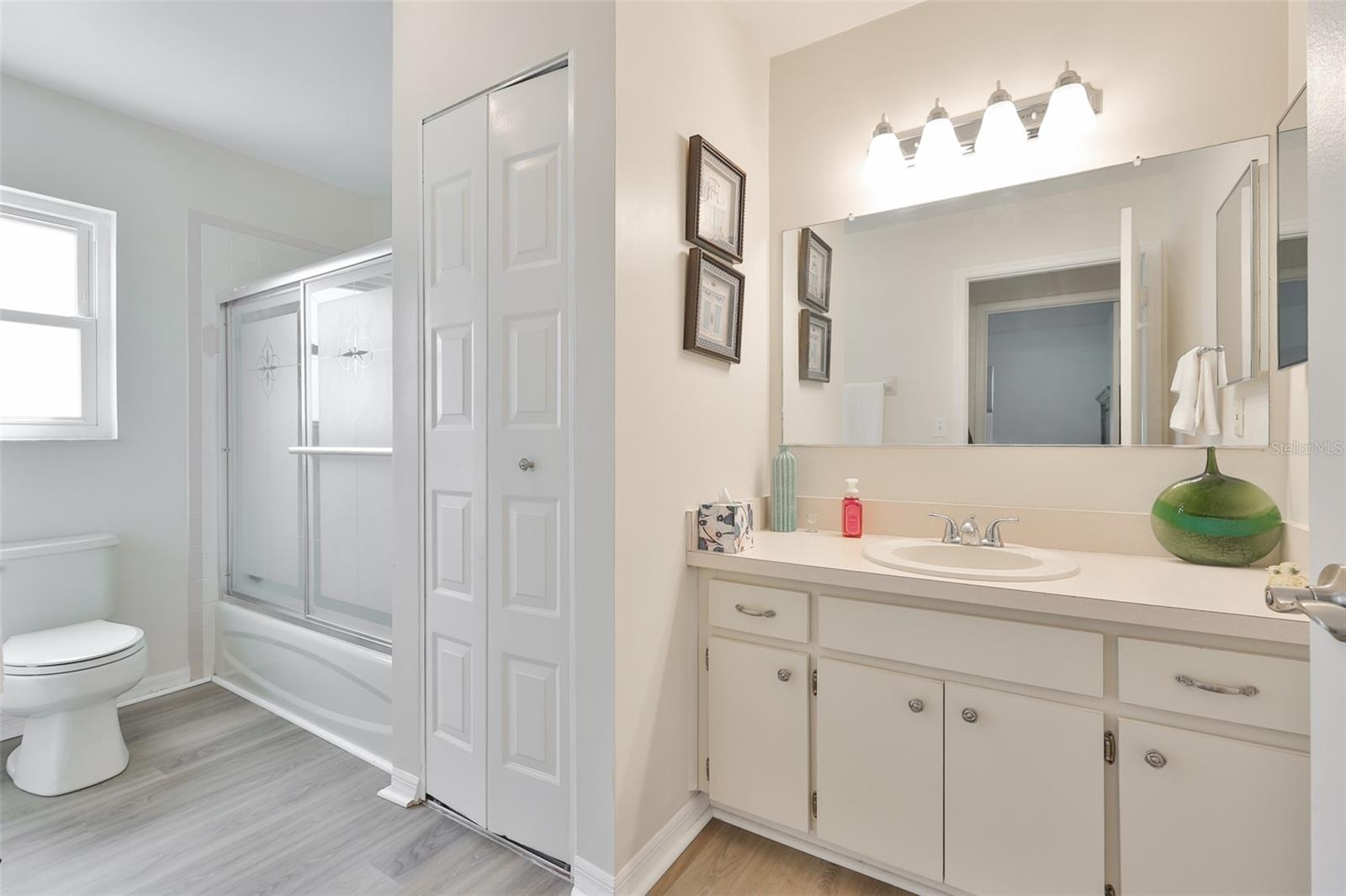 Guest En Suite Bath w/Shower Tub, Linen Closet, & Large Vanity