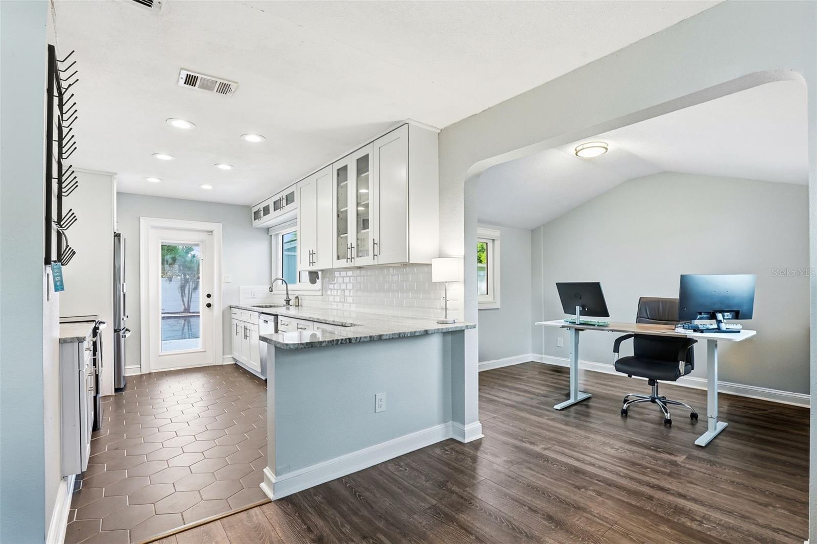 kitchen open to great room and office/flex room