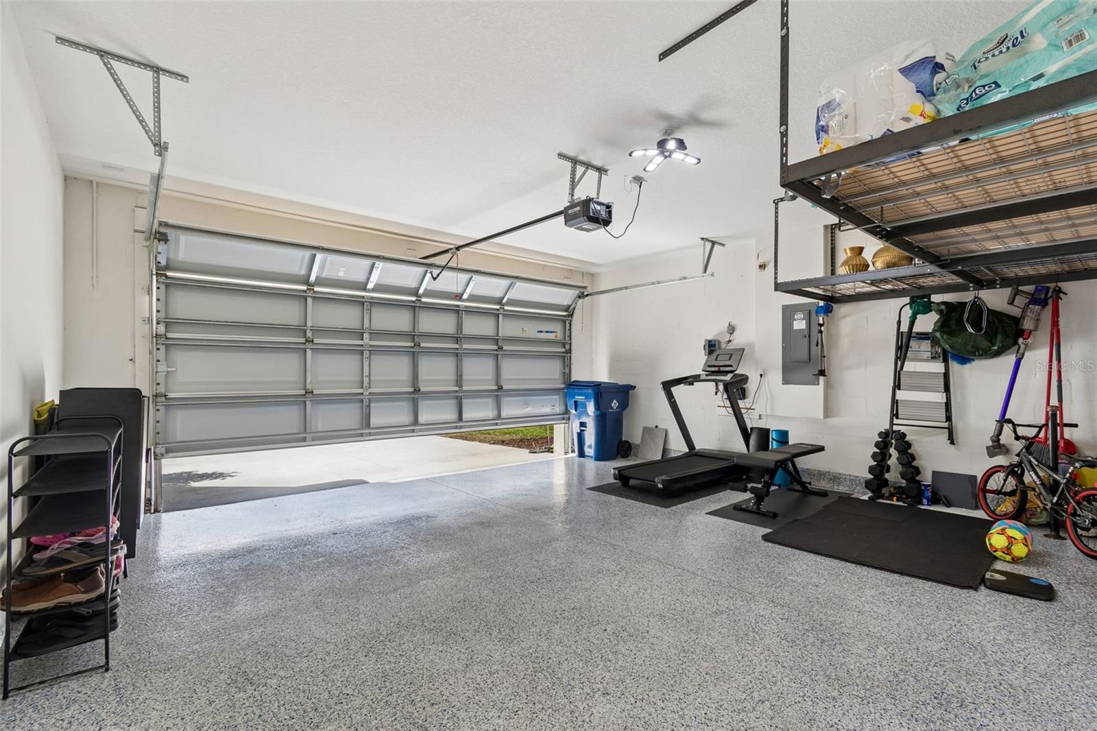 Garage with Epoxy floors and Overhead Storage