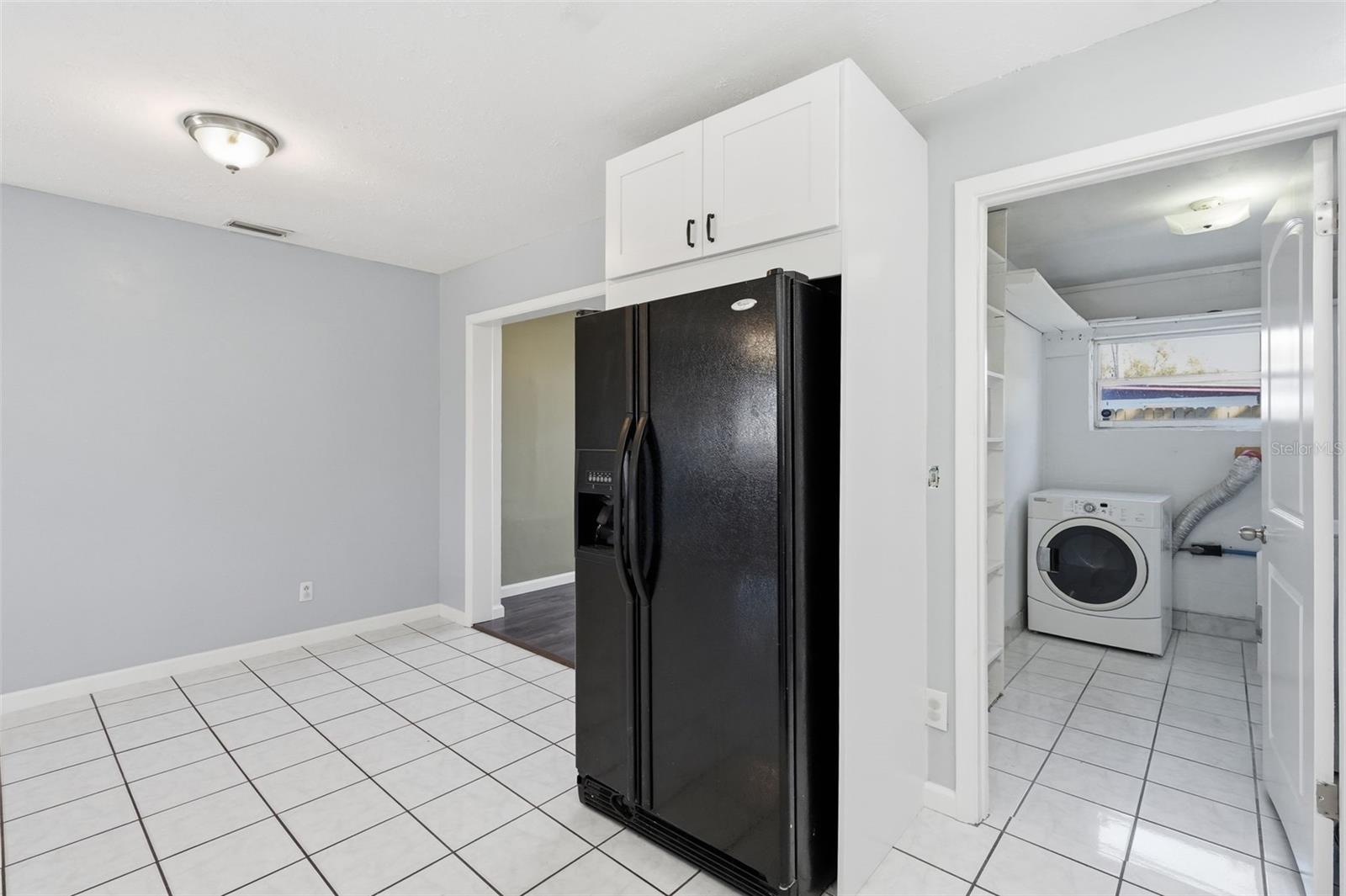Inside Laundry/Utility Room.  Bonus Room on the other side.