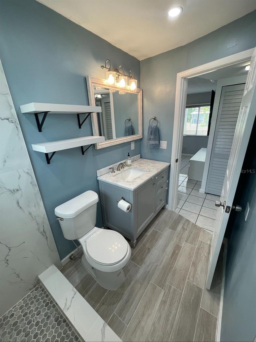 Remodeled bathroom.  Linen closet just outside the door.