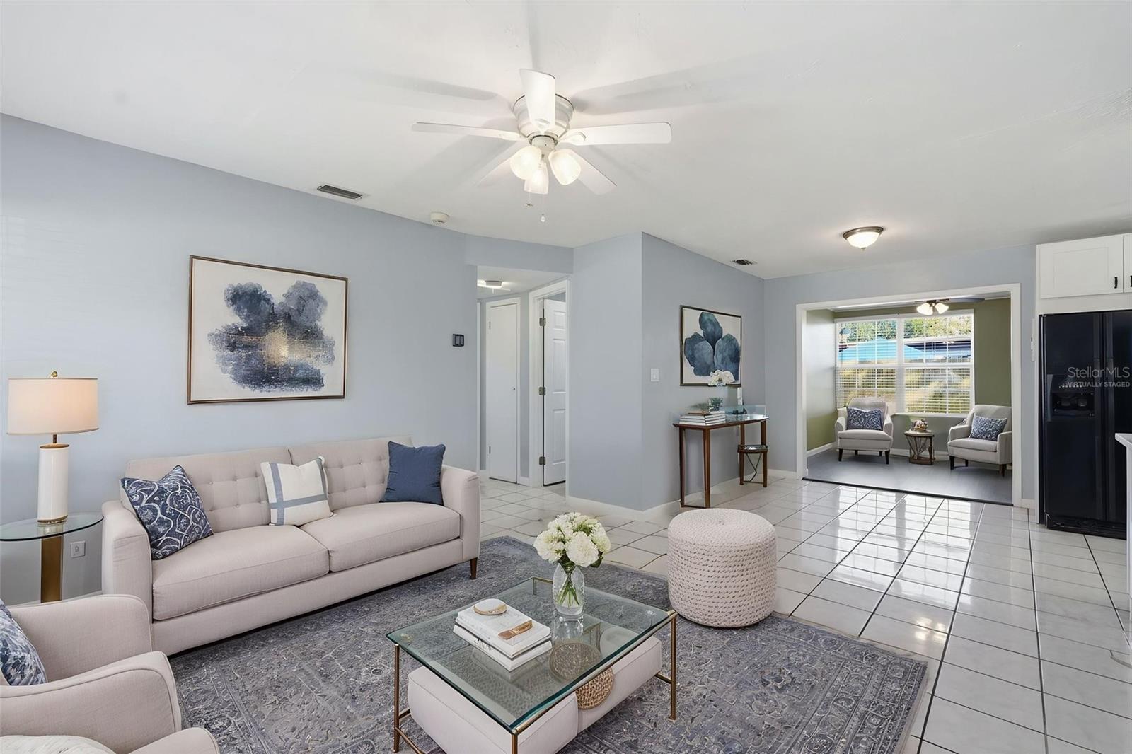 VIRTUALLY STAGED Living Room.  Open to Kitchen/Dining Area.  This is a great entertaining space