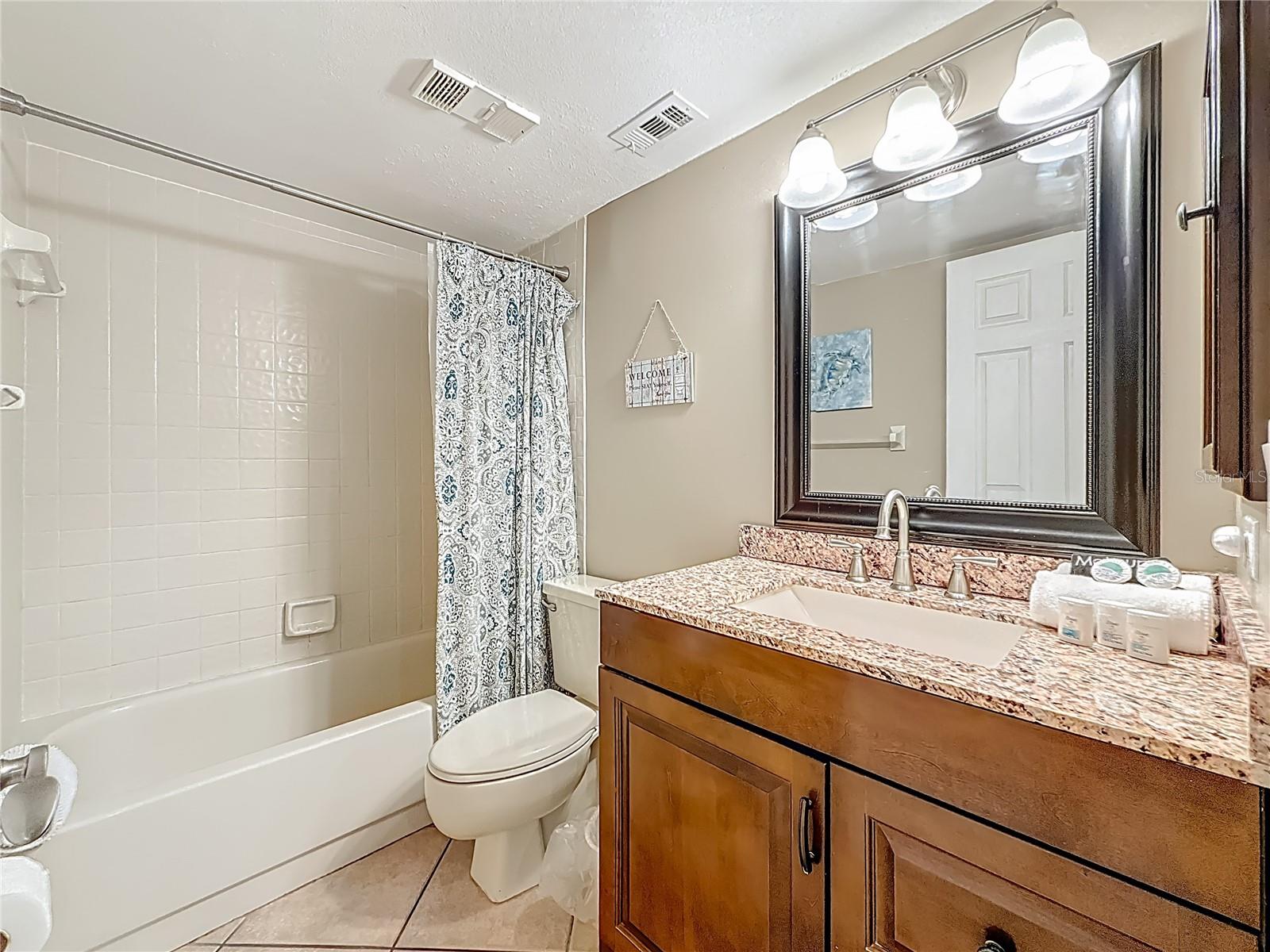 Second Bathroom with tub and granite counter tops!