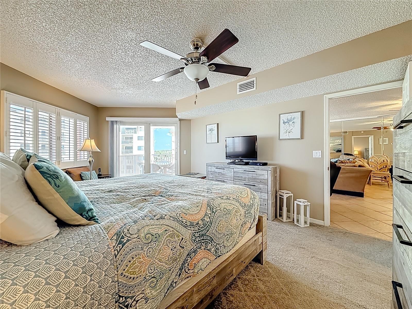 Primary Bedroom with sliding door to balcony!