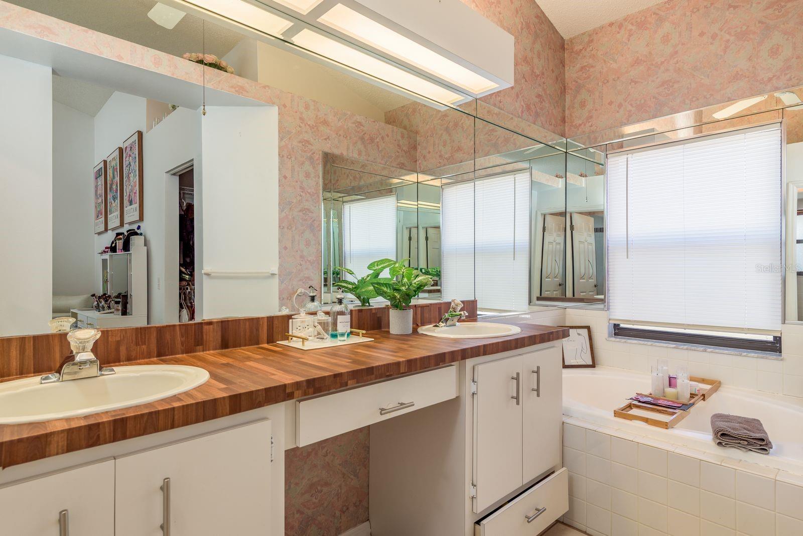 Primary Bath with soaking tub and separate room for toilet and shower for privacy!