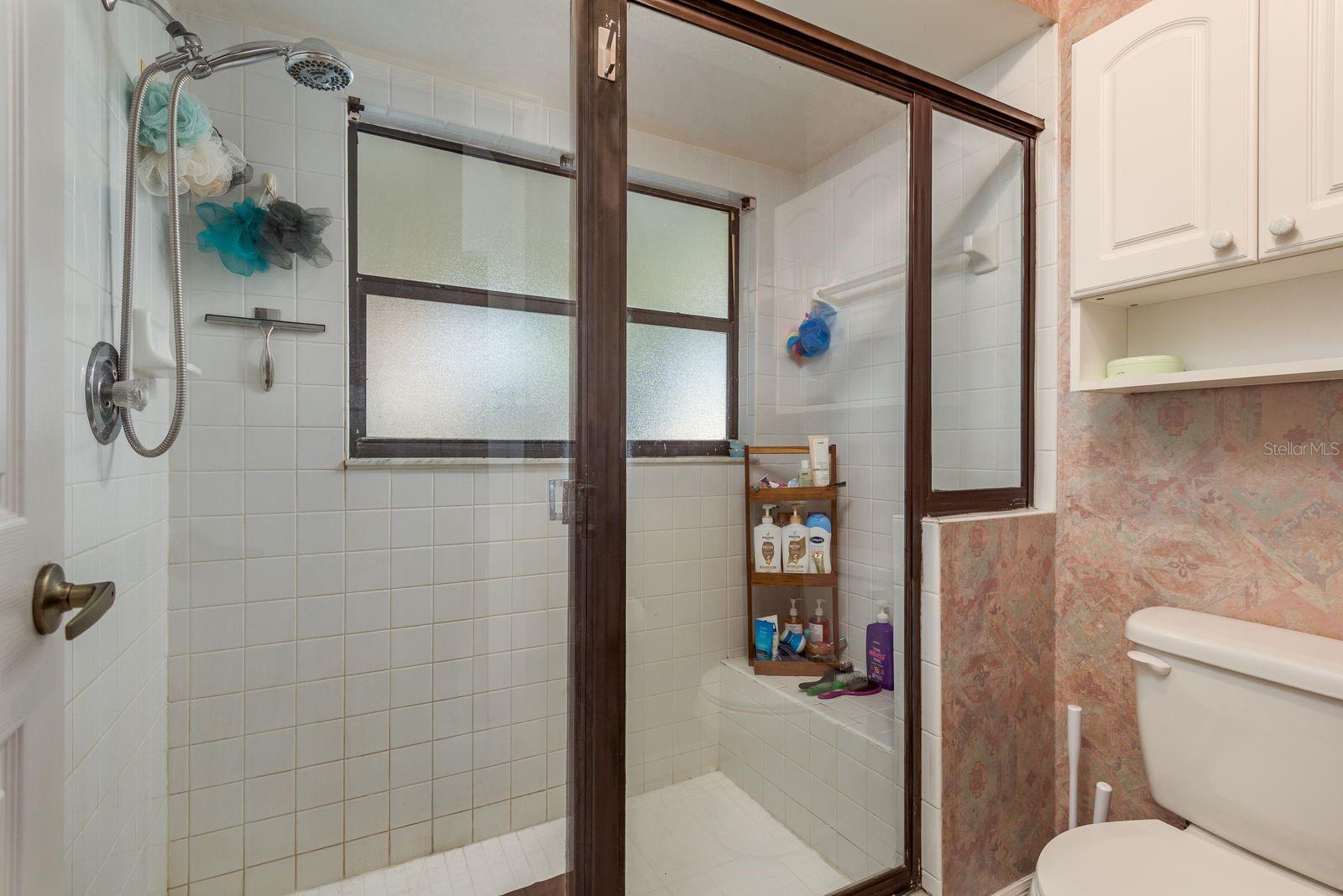Primary Bath with soaking tub and separate room for toilet and shower for privacy!