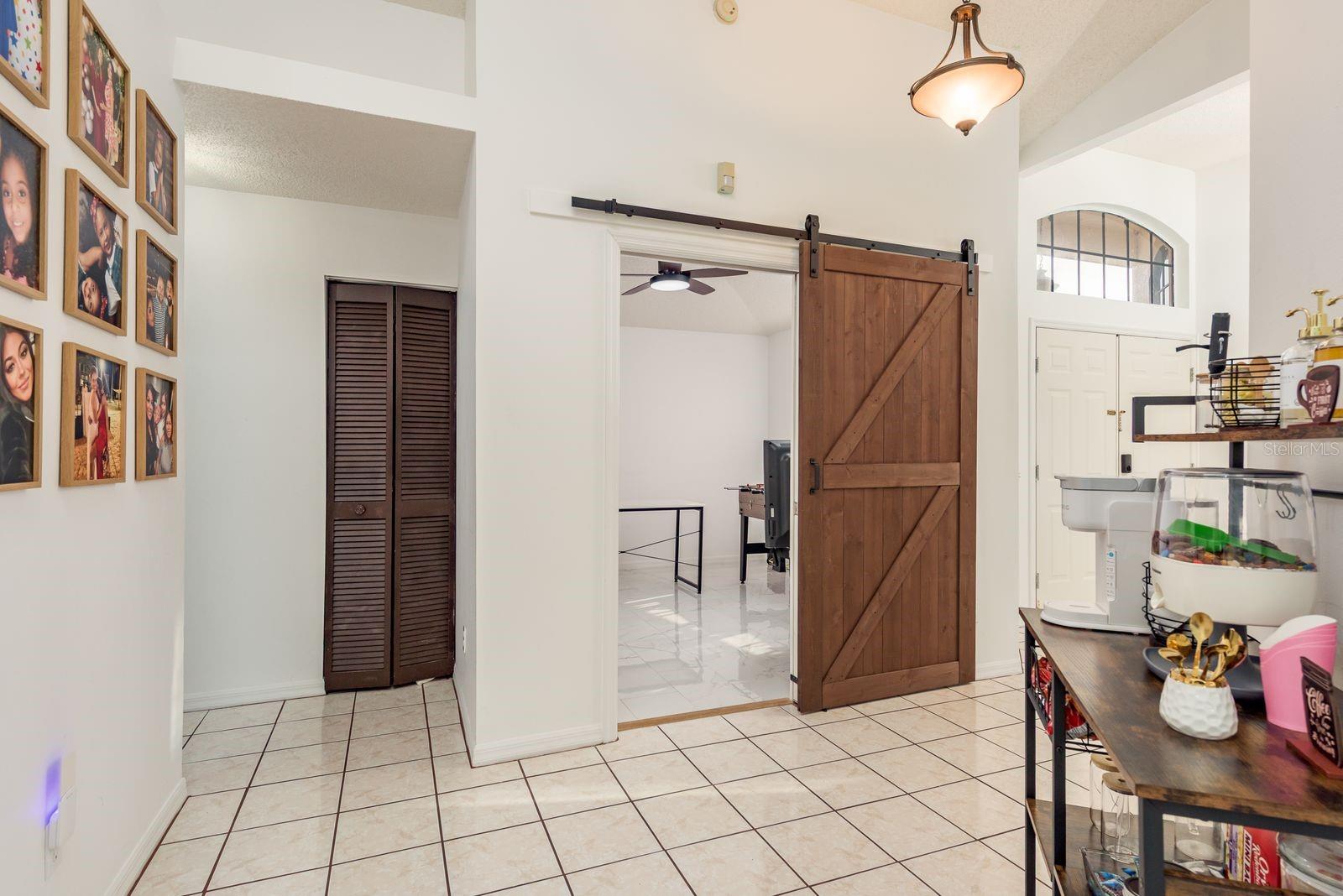 Den space with sliding barn doors. Makes a perfect 3rd bedroom or home office space