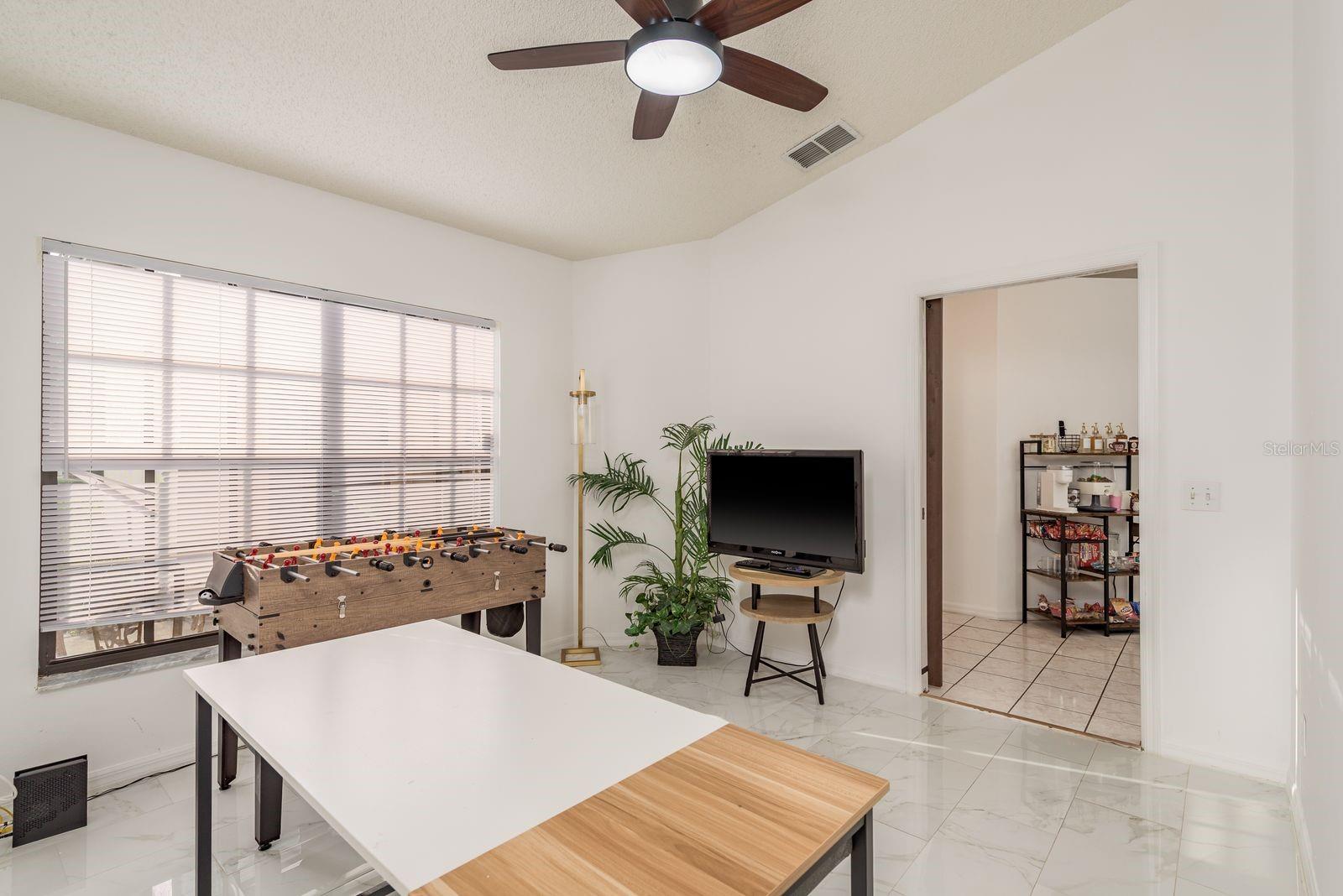 Den space with sliding barn doors. Makes a perfect 3rd bedroom or home office space