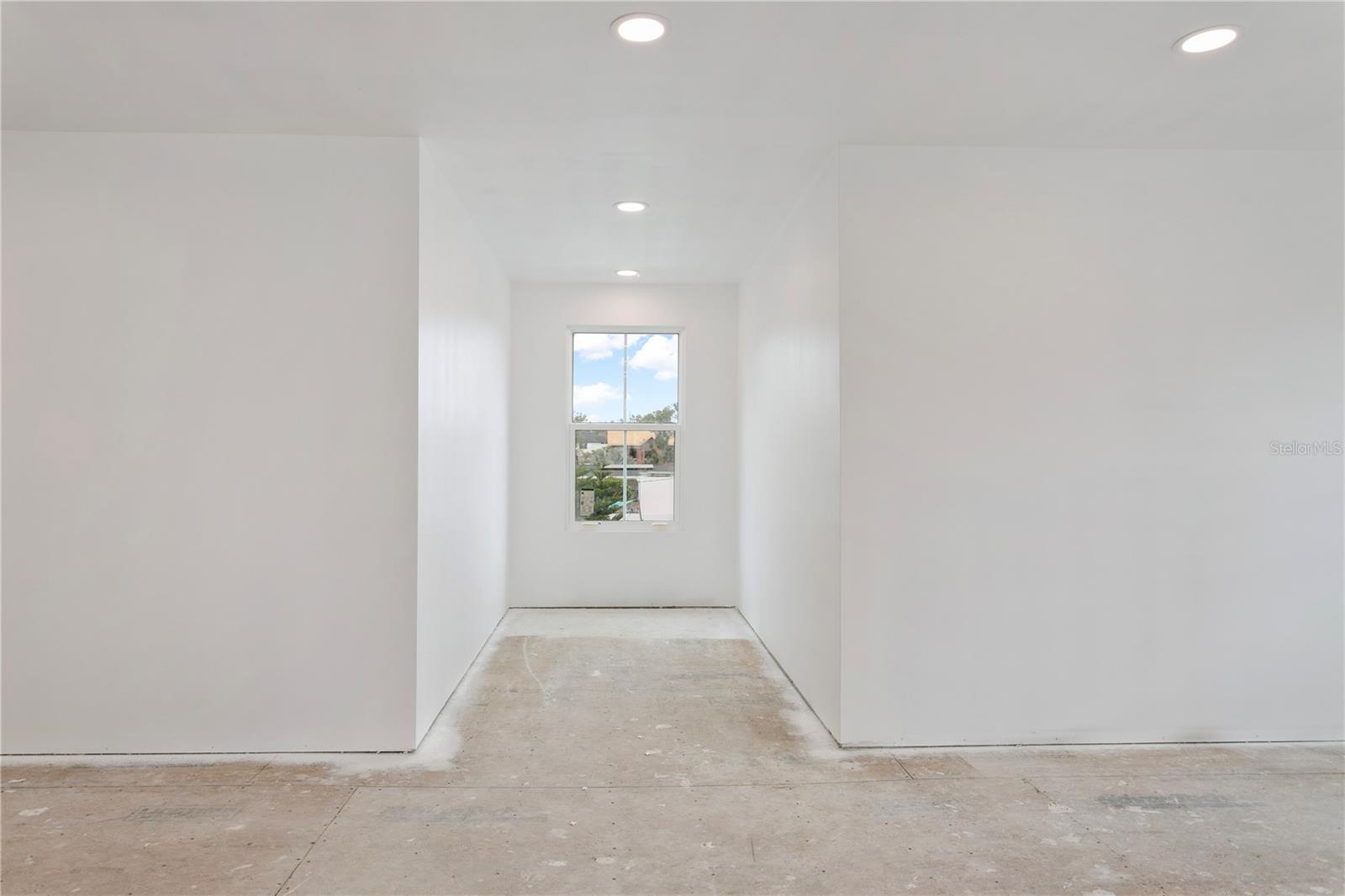 Unfinished space above garage.