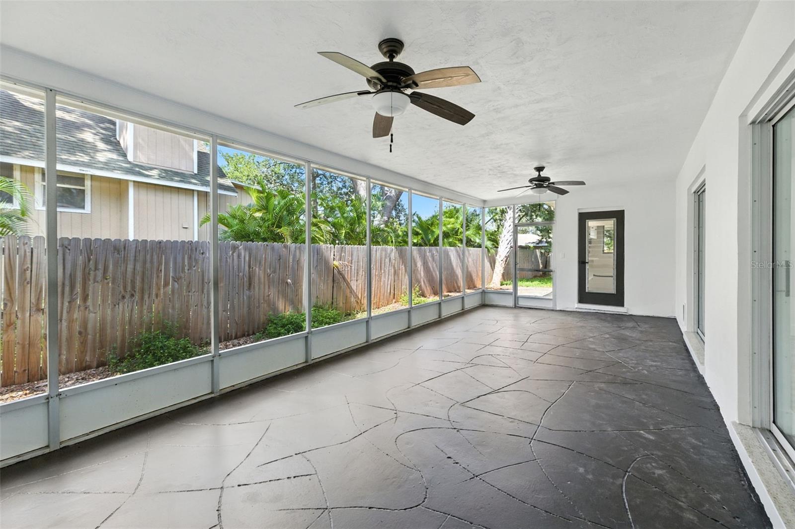 Enjoy Florida living year round from this large screened porch