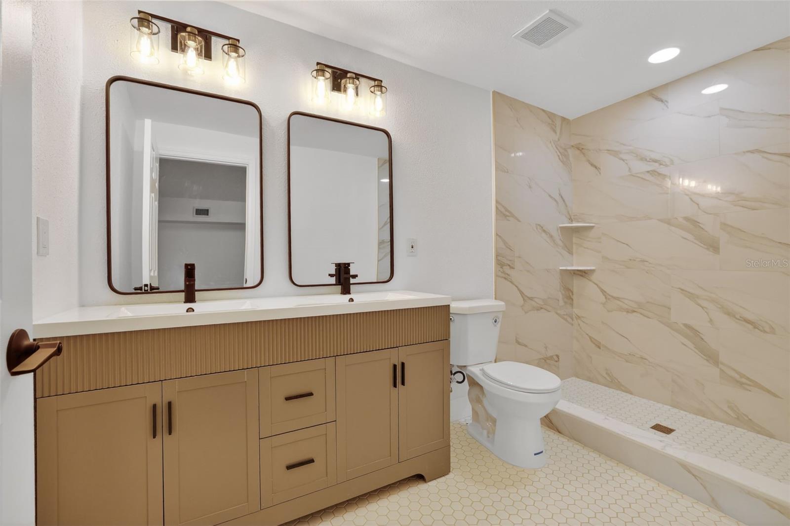 Double vanity with modern fixtures