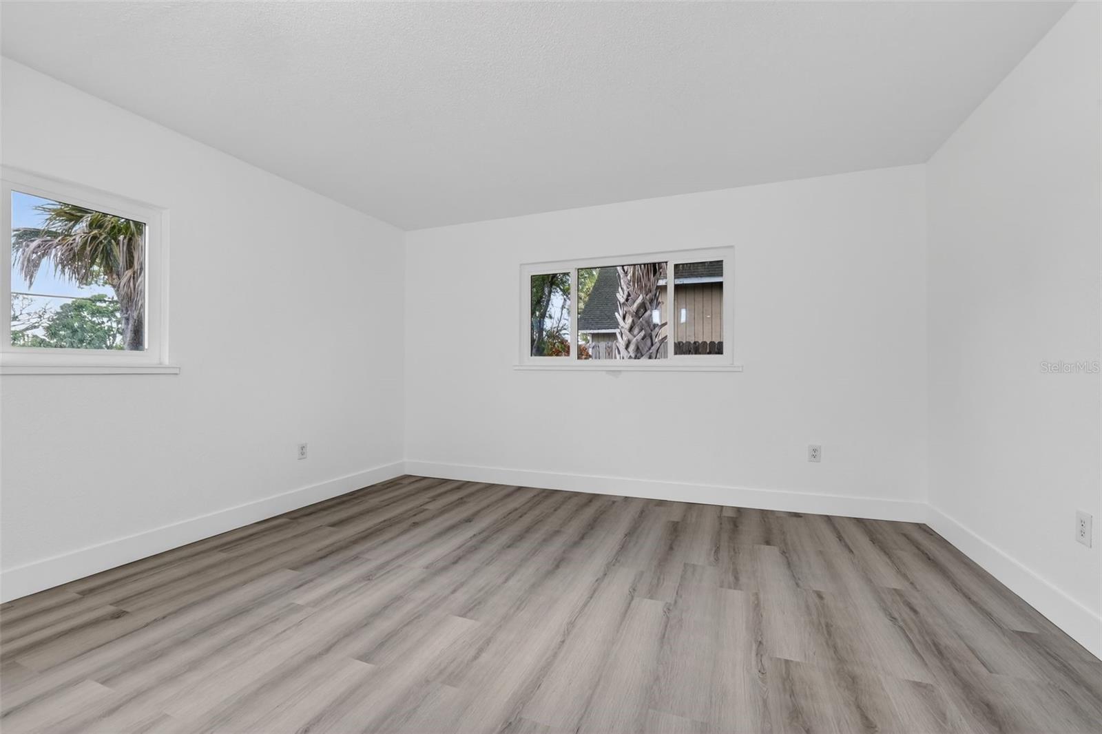 Bright secondary bedroom with natural light