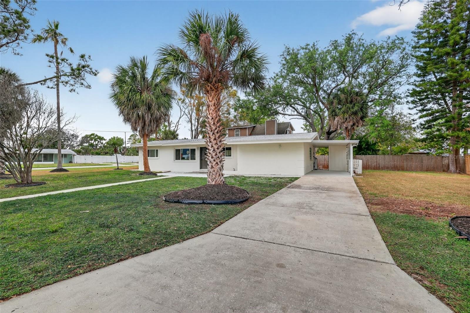 Extended driveway provides plenty of parking for multiple vehicles