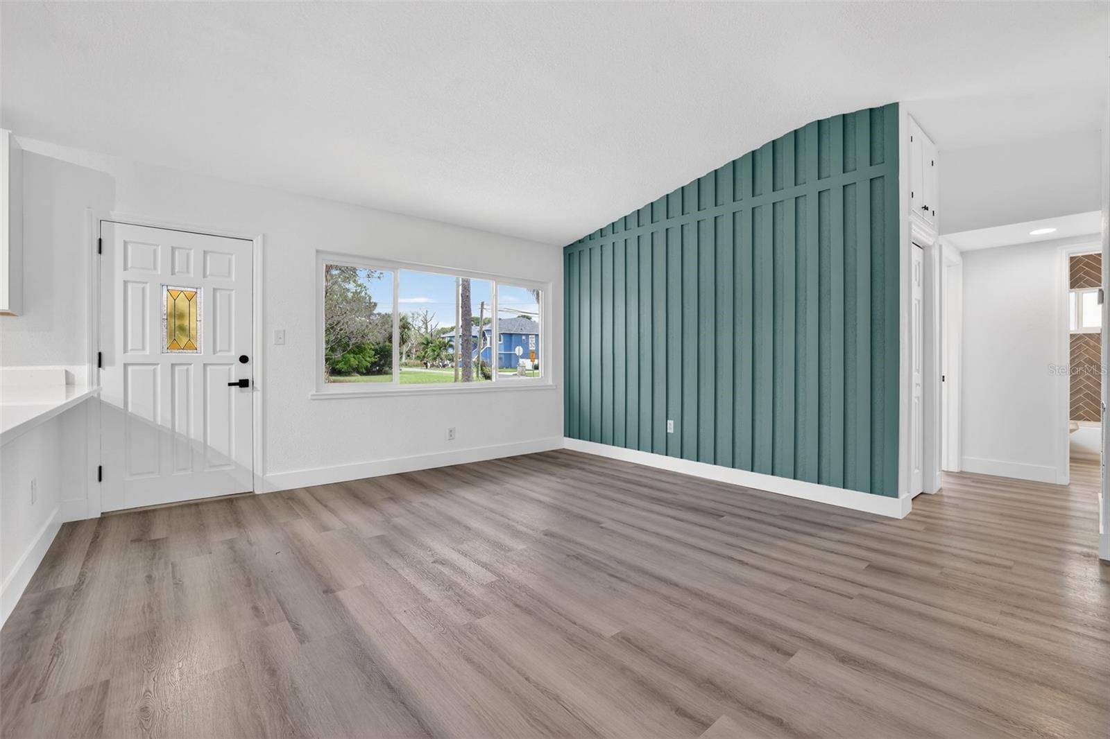 Custom accent wall adds modern character to the living space