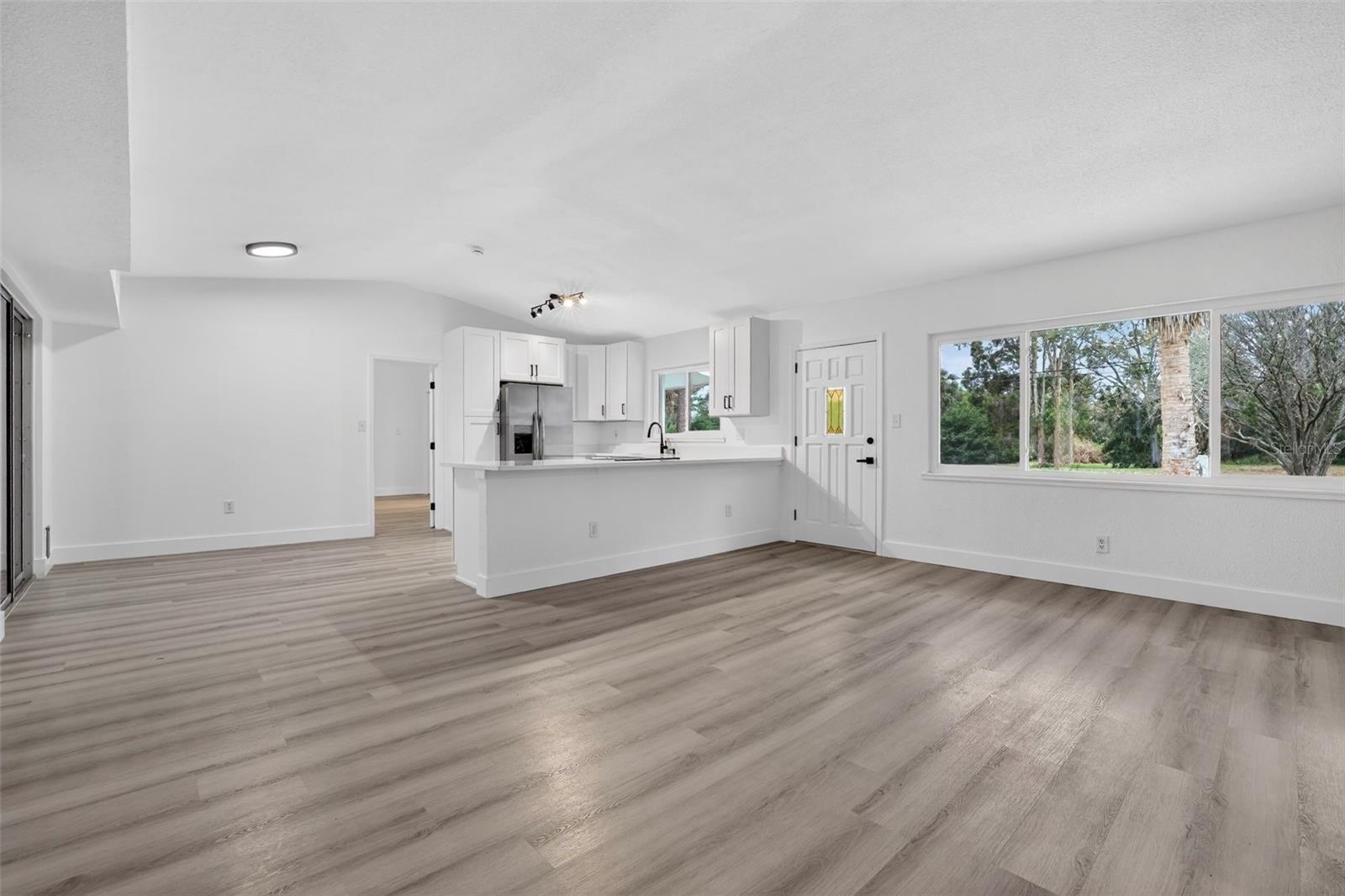 Spacious living room with high ceilings and open layout
