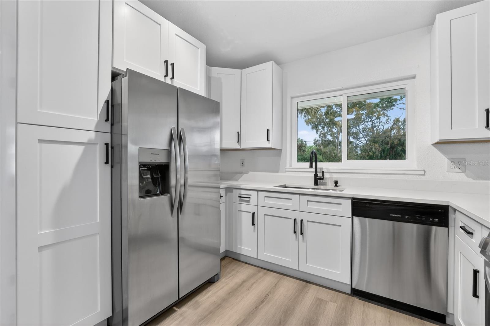 Modern kitchen with stainless steel appliances