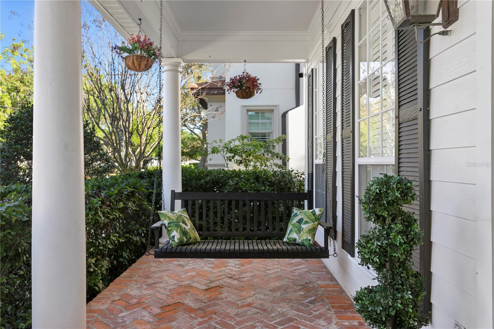 Come sit and relax on this beautifully covered front porch
