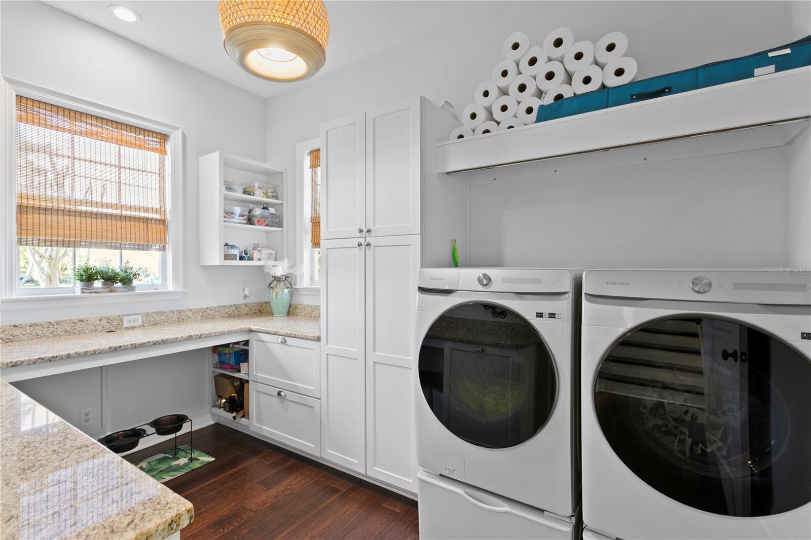 Who wouldn't love this space for laundry, gift wrapping or arts and crafts?