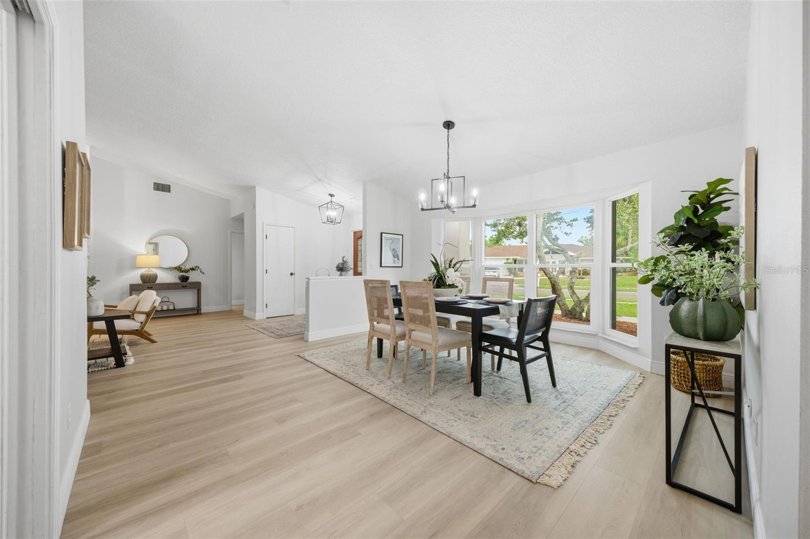 Bright & airy dining space with new lighting