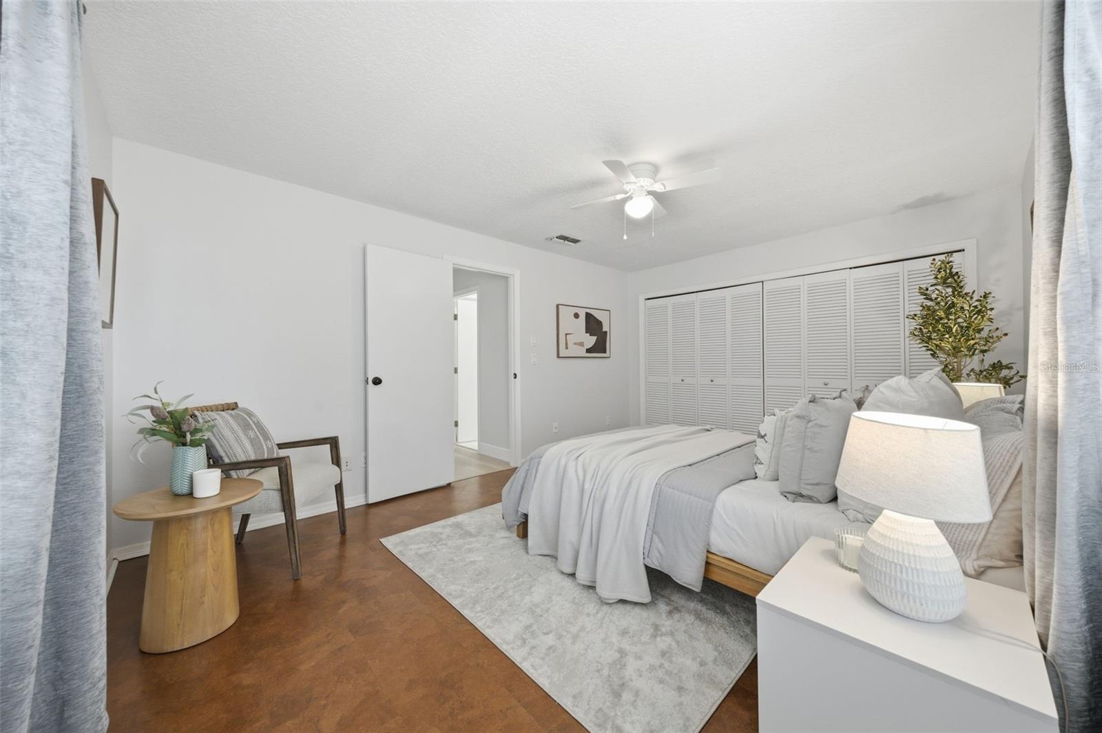 Secondary bedroom with a full wall of closet space