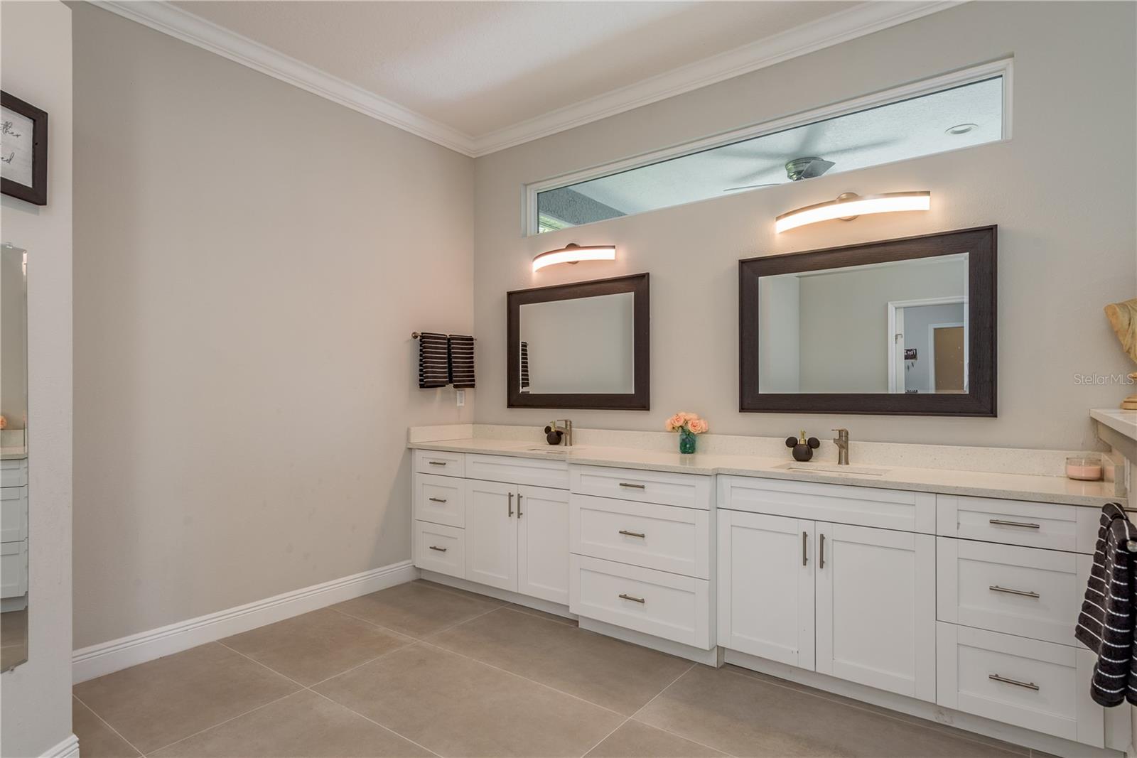 Primary Bathroom with dual vanities and lots of space!