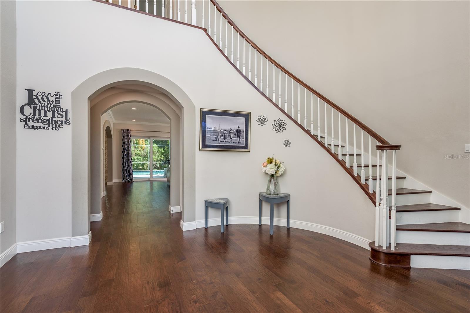 Cascading spiral staircase to upper level!