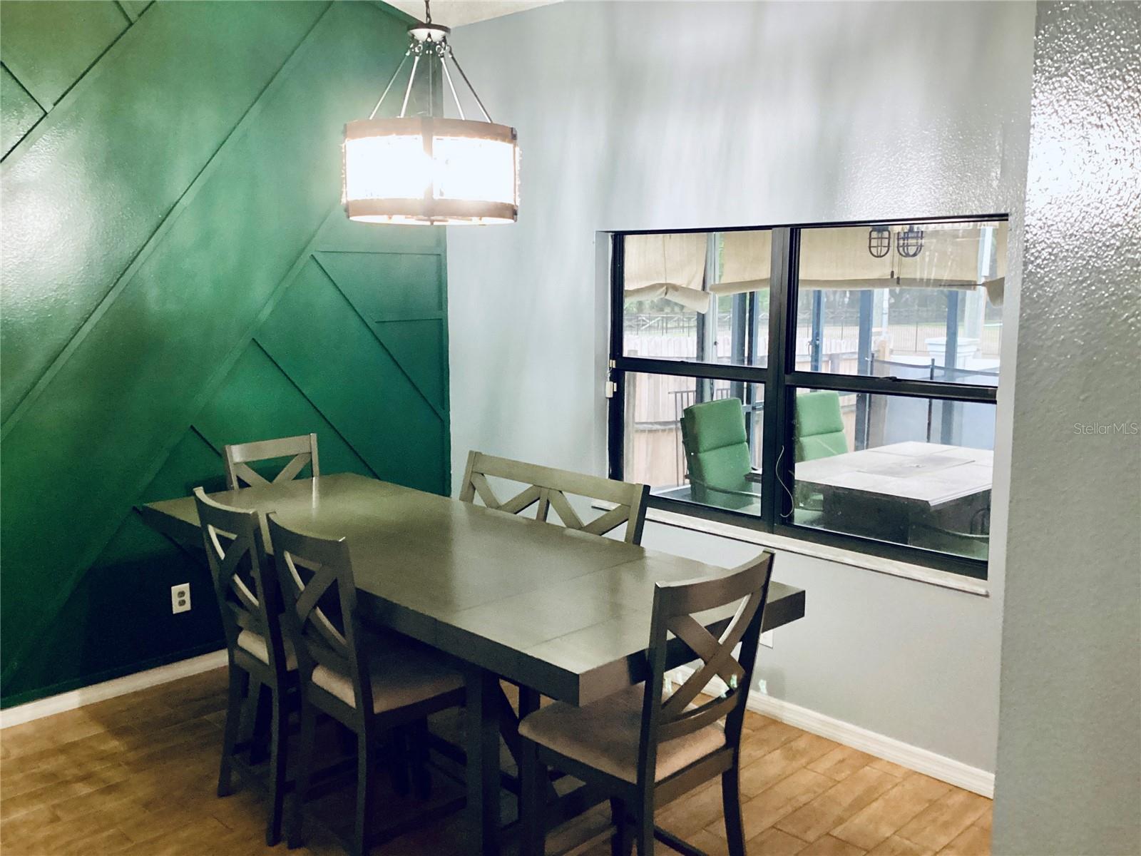 Dining Rm with Window to outdoor Dining Patio