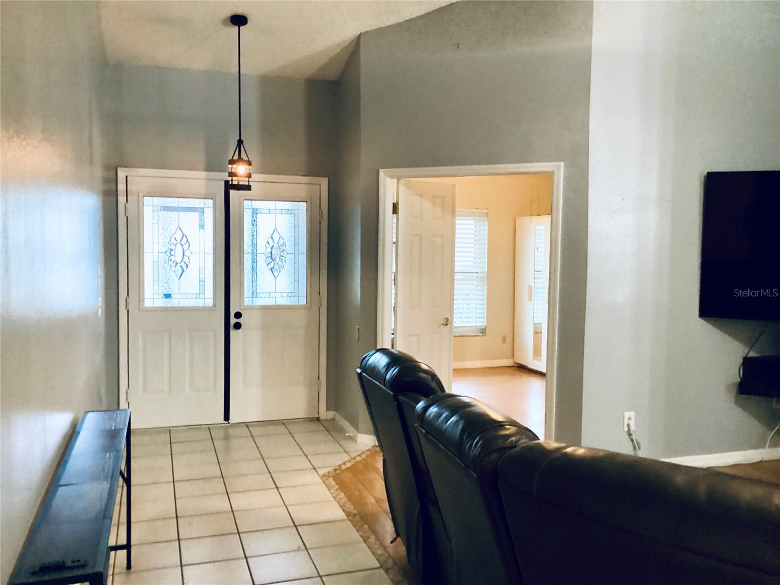 Front Entrance with view into Additional Bedroom