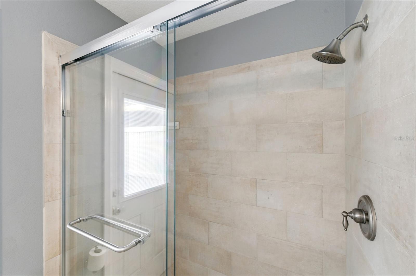 Walk-in shower in primary bathroom