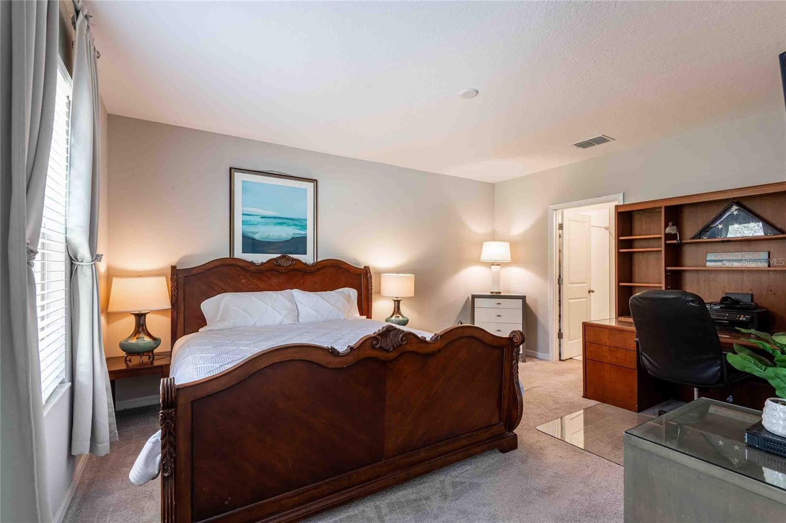 Spacious primary bedroom downstairs.