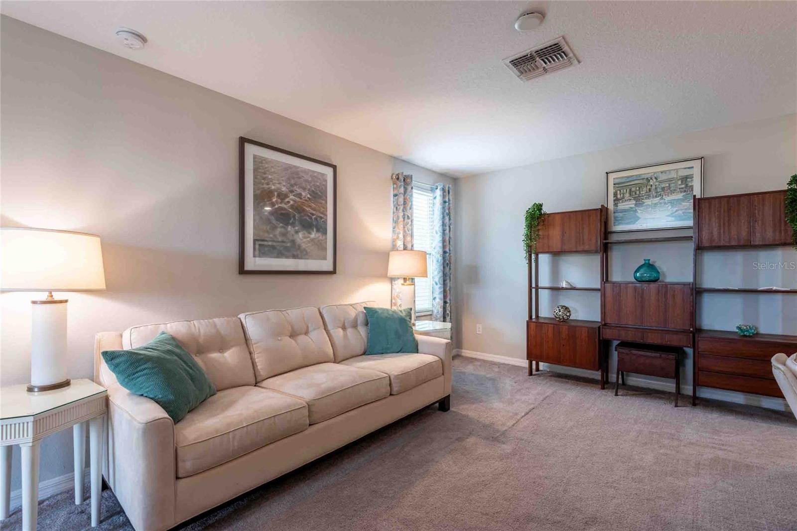 The bonus space includes a ceiling fan and a light fixture hookup.