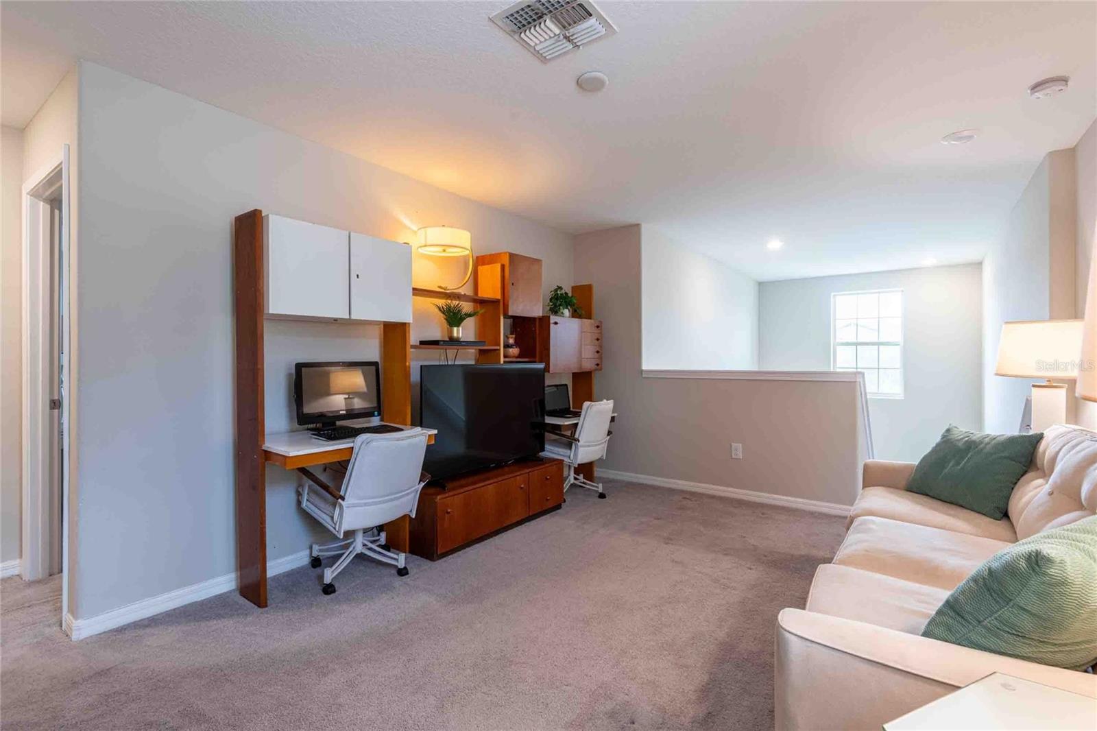 Endless possibilities for this upstairs space.