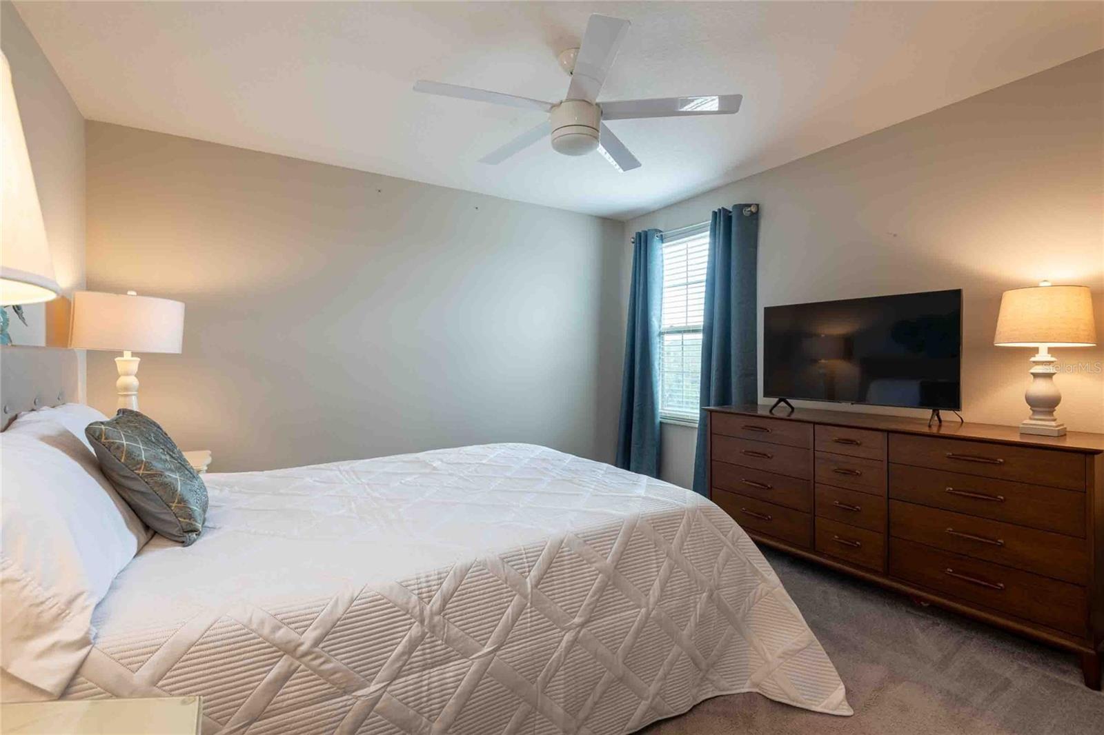 First bedroom with walk-in closet.