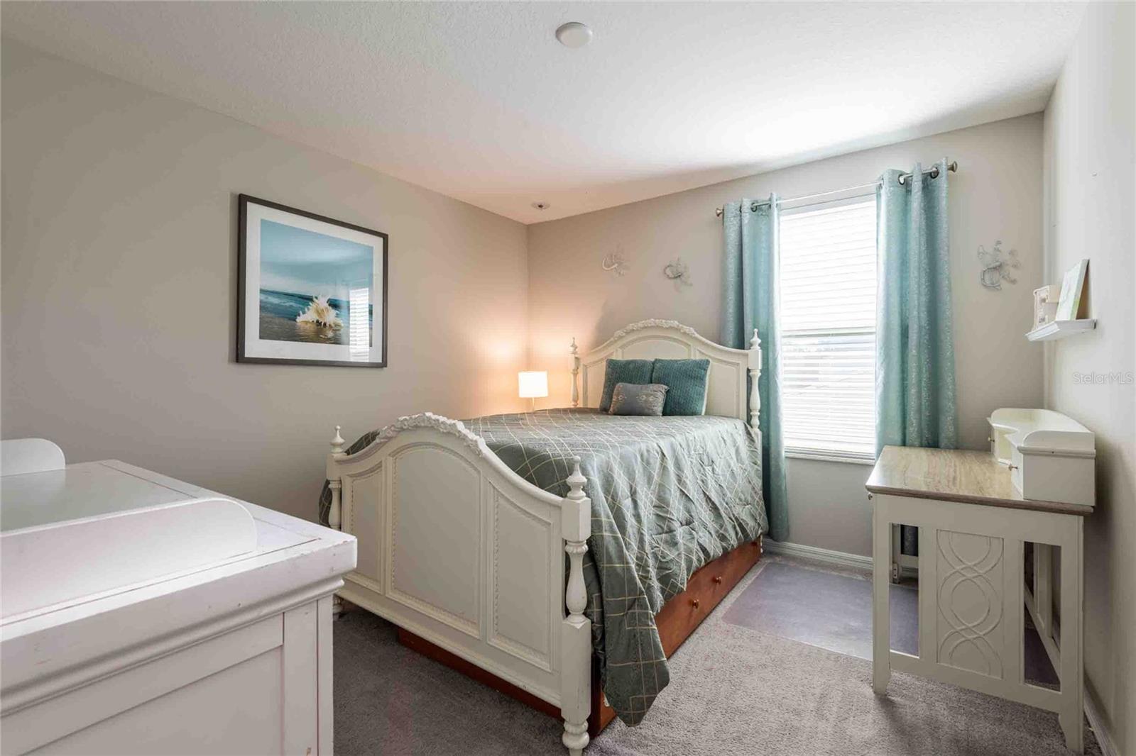 Third bedroom with walk-in closet.