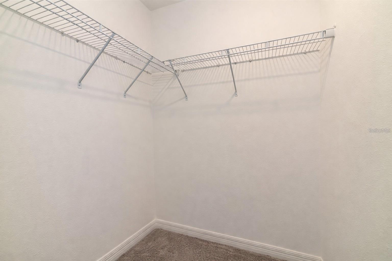 Walk-in closet in third bedroom.