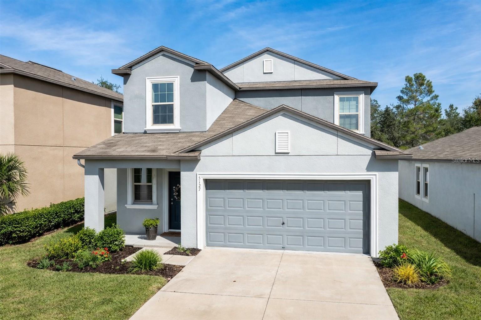 Virtual image with the landscaping trimmed back.