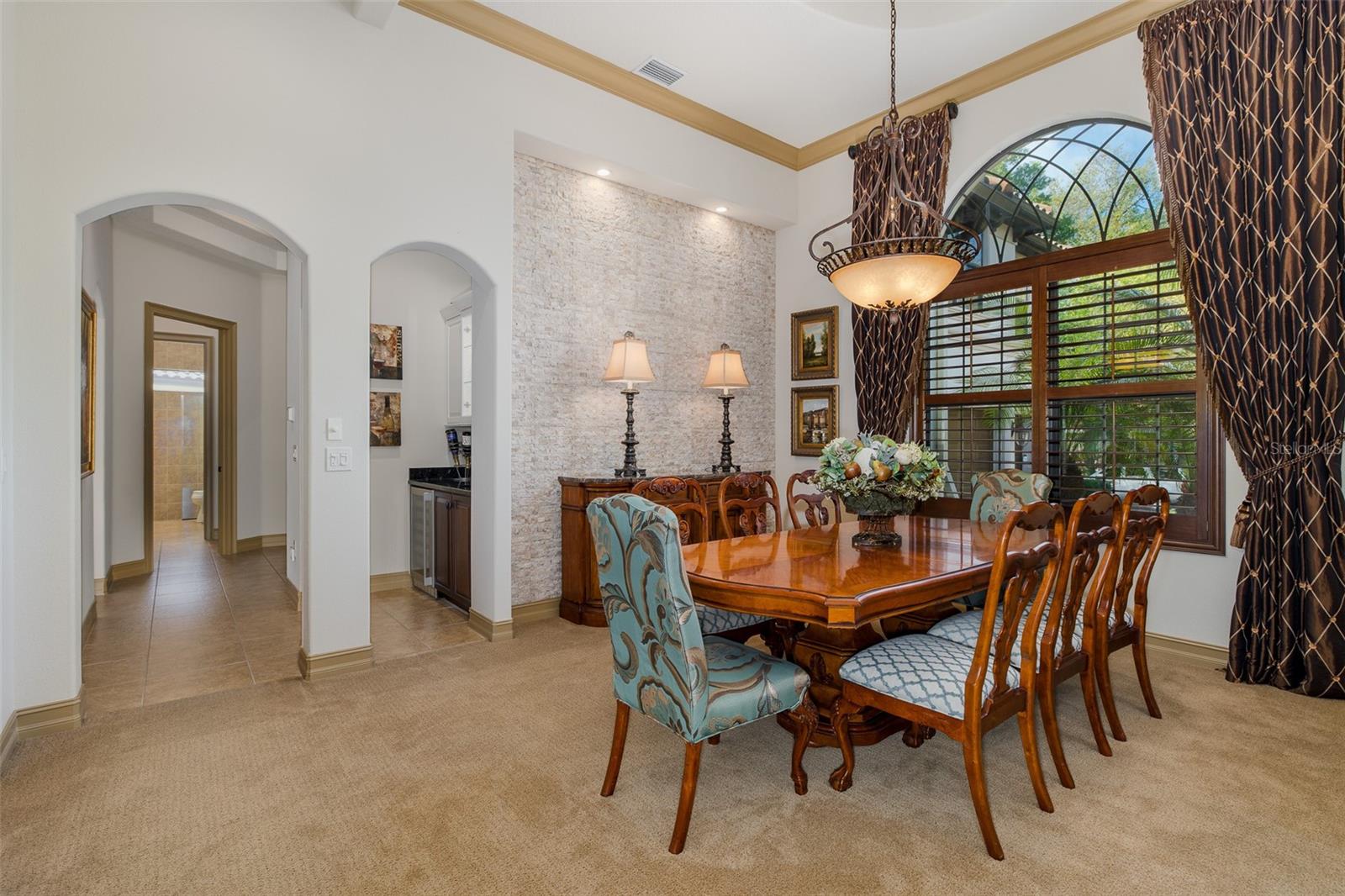 Formal Dining Room with Stack-Stone Accent Wall