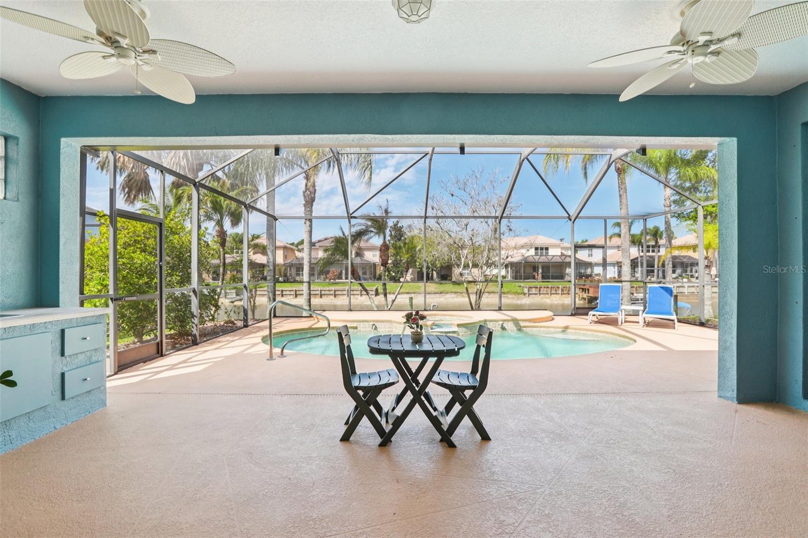 Wide open sliding doors for open-air feel and view of lake