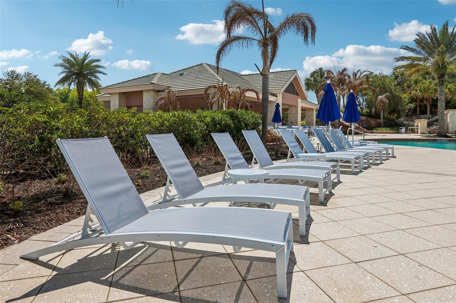 Lounge with friends at the community pool