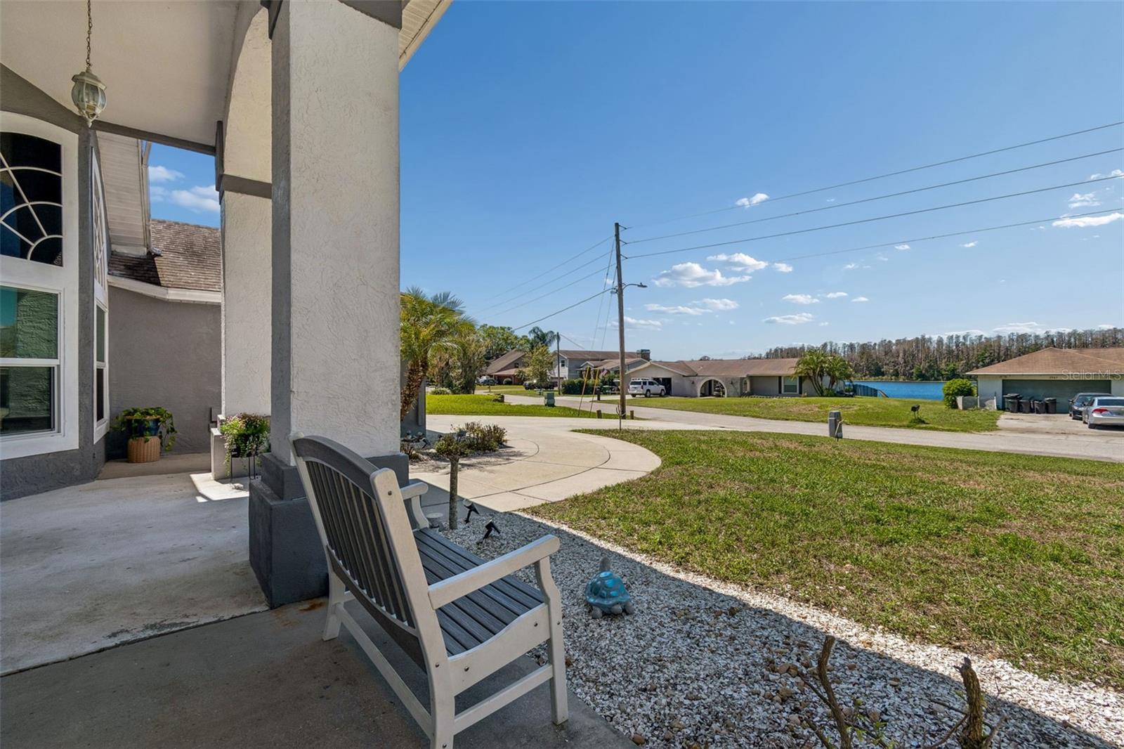 Peek-a-boo view of the lake...while relaxing with a cup of coffee or a good book when sitting out front, gazing out the window in the living room or enjoying a meal in the dining area!