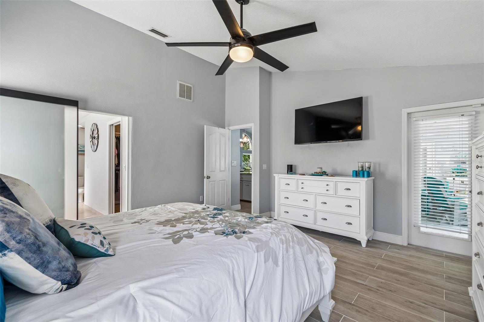 Exterior door leads to the pool deck area.
