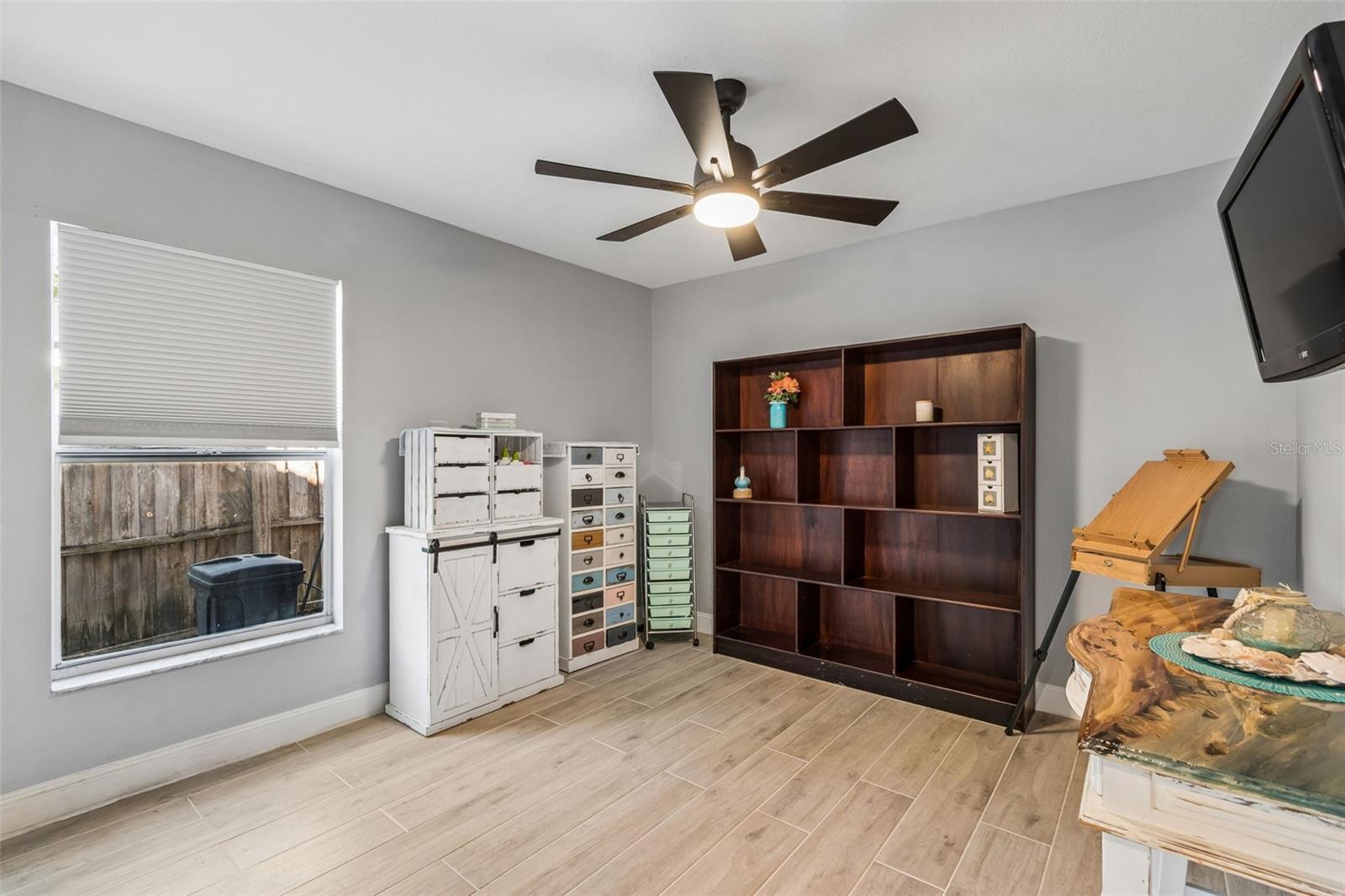 Middle bedroom, presently used as a craft room.