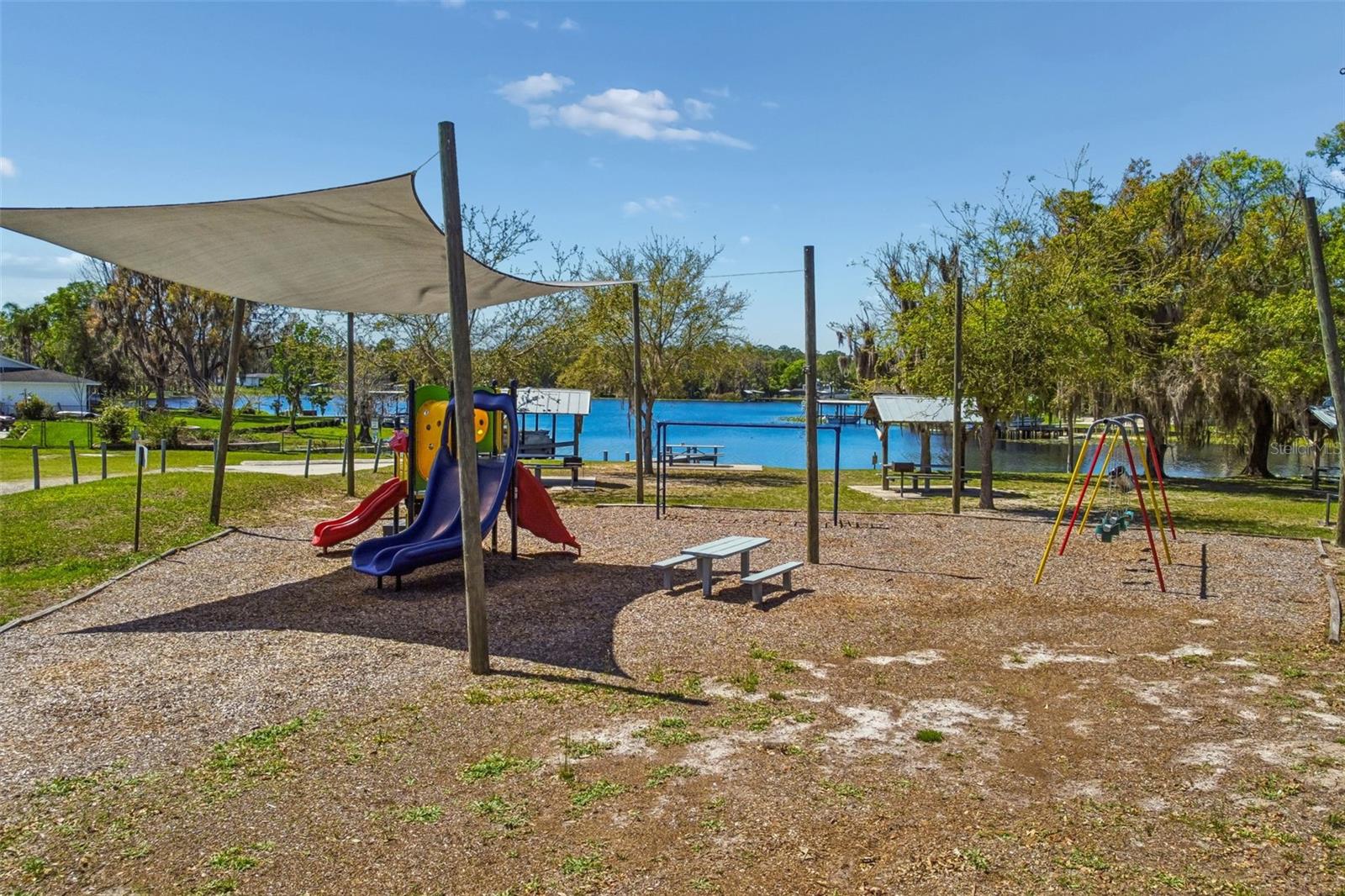 Playground equipment and swingset to enjoy...take a lunch and enjoy it by the water!