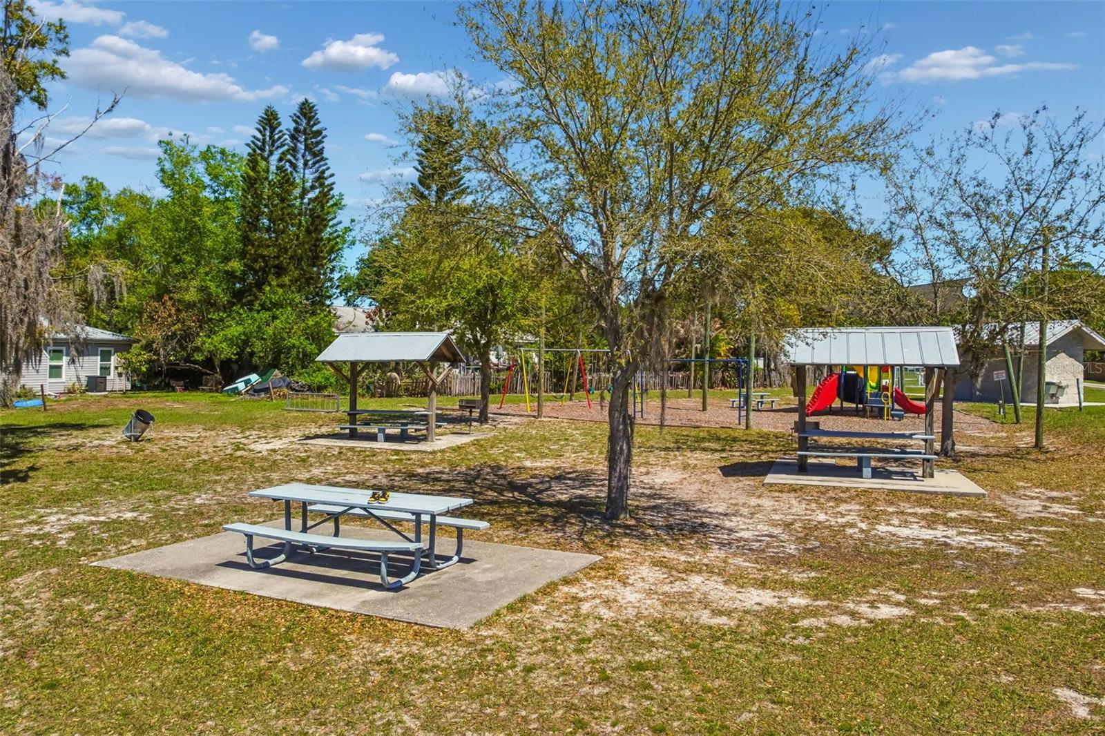 Bath house in the background of the play area...